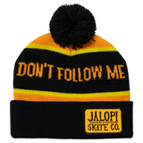 Black, orange, and yellow beanie with 'Don't Follow Me' text and Jalopi Skate Co. logo.