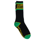 Black sock with green accents and yellow text on a white background