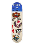 A FOY brand 6-inch removable tattoo sticker on a skateboard deck, featuring classic tattoo-style illustrations of a tiger, a skull with a heart, a black cat with blood, and a colorful dragon