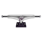 A skateboard truck with a silver metal plate and black baseplate, featuring the 'Kessner' brand logo on the front