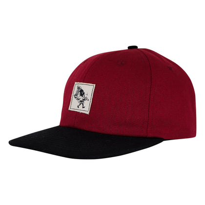 Creature 9 to 5 Strapback Hat in maroon with a black brim and unique cartoon patch on the front.