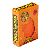 Orange box of OJ Juice Cubes 3/8in skateboard risers, with a cut-out showing an orange riser inside.