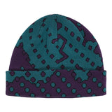 Quasi Skateboards Dither Beanie in eggplant and teal with an abstract, dithered dot pattern.