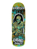 Heroin Skateboards Dead Dave KO2 Mummy Deck featuring a green mummy skeleton graphic in a coffin, on a gold and black skateboard.