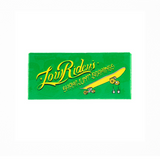 Low Rider Bearings | Shake Junt green box with yellow cursive text and a yellow skateboard graphic emitting sparks.