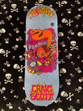 Heroin Skateboards Craig Questions Scrap Metal Deck. Light blue skateboard with detailed Roadkill graphic of a house, skull, and chains.