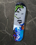 Quasi Skateboards Lizard Kang 8.5" deck with a halftone face, green lizard, and colorful abstract graphic.