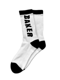 Baker white crew socks with bold black 'BAKER' lettering, black cuffs, heels, and toes.