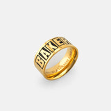 Gold Baker brand logo ring with black lettering and "GUARDING A BAD NAME SINCE 2000" inscription.
